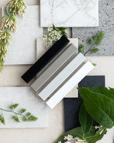 Collection of frame color samples on textured backgrounds to help you choose the perfect finish for your home.