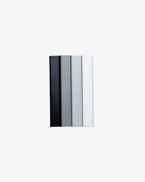 Frame color samples in black, gray, and white to help you choose the perfect finish for your home decor.