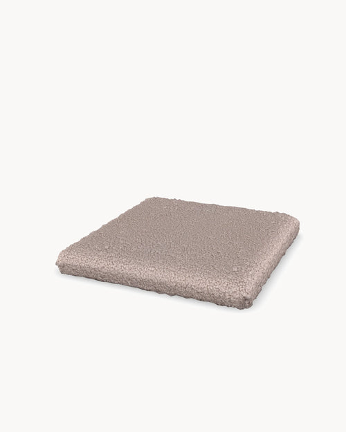 Cushion for the Freja bar stool in Greige bouclé, three-quarter view