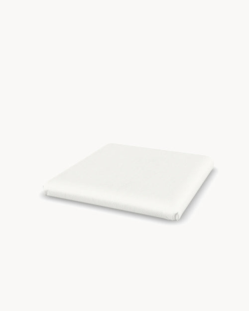 Cushion for the Freja bar stool in Ivory vegan leather, three-quarter view