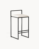 Bar Chair Freja with black frame and ivory leather cushion, perfect for modern kitchen islands and bar counters.