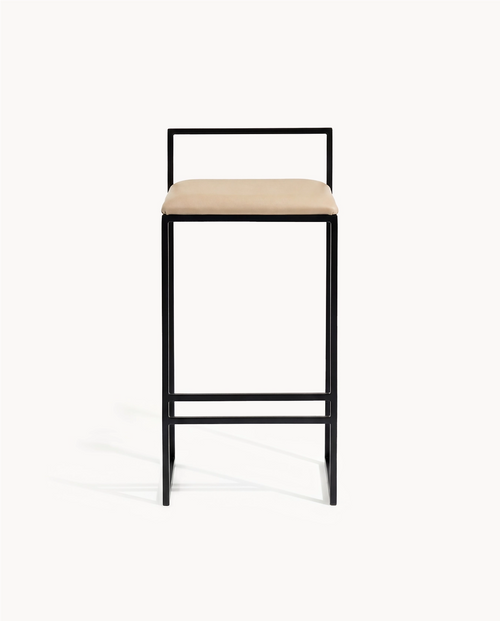 Leather Bar Stool Freja with black frame and latte leather cushion, designed for modern indoor use.