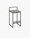 Freja outdoor bar stool featuring a minimalist design with a black frame and gray seat, perfect for stylish outdoor settings.