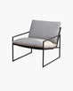 Kenny Lounge chair in black with fossil acrylic cushions, blending modern design and comfort for any living space.