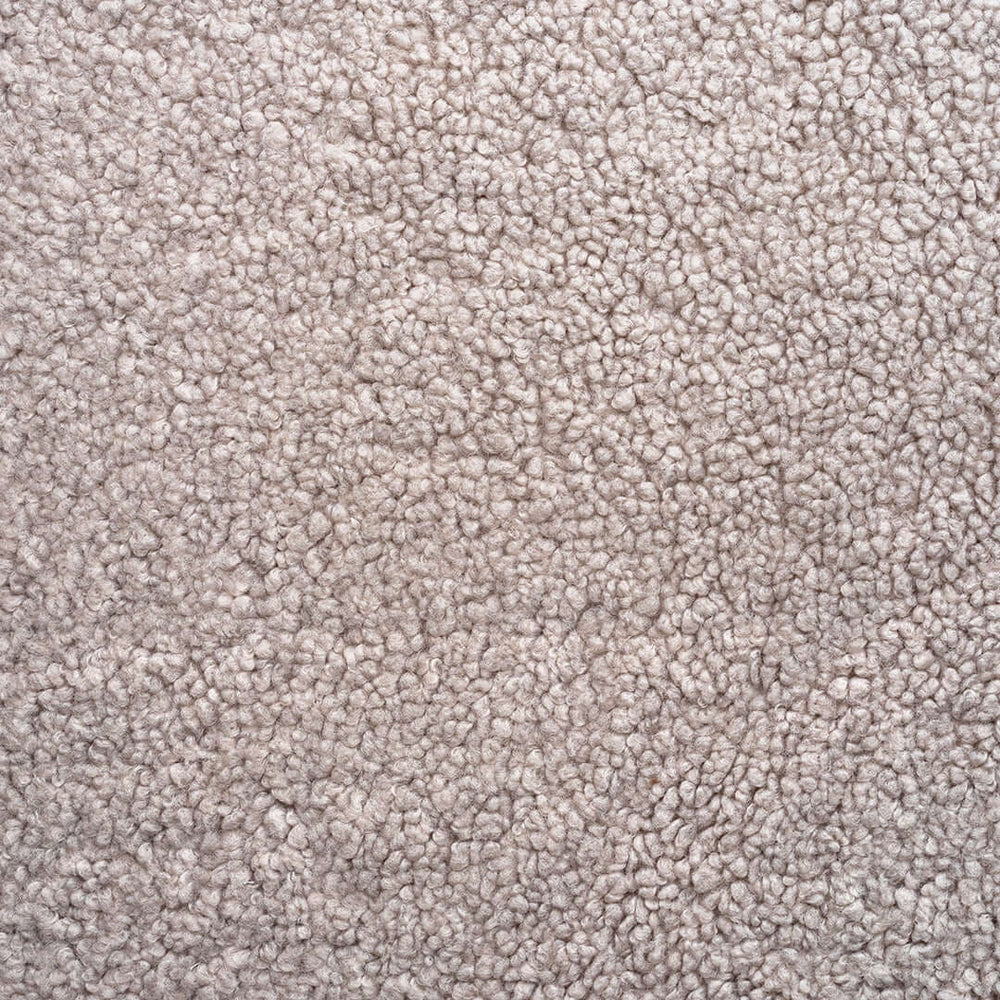 Close-up of the greige bouclé upholstery used on the Anton bench