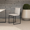 Isa outdoor chair in black frame with fossil acrylic, featuring minimalist Scandinavian design for timeless elegance.