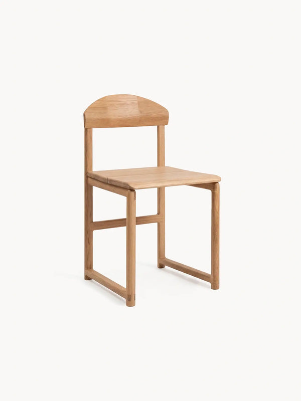 Wooden solid oak chair on a white background