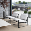 Kenny lounge chair in black with marble acrylic, offering modern style and comfort for outdoor relaxation.