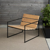 Outdoor Lounge Chair Arvid in black frame and teak wood, perfect for outdoor relaxation.