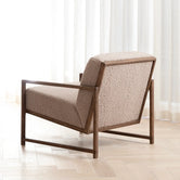Armchair Einar in dark oak frame with greige bouclé cushion, perfect for stylish and neutral interiors.