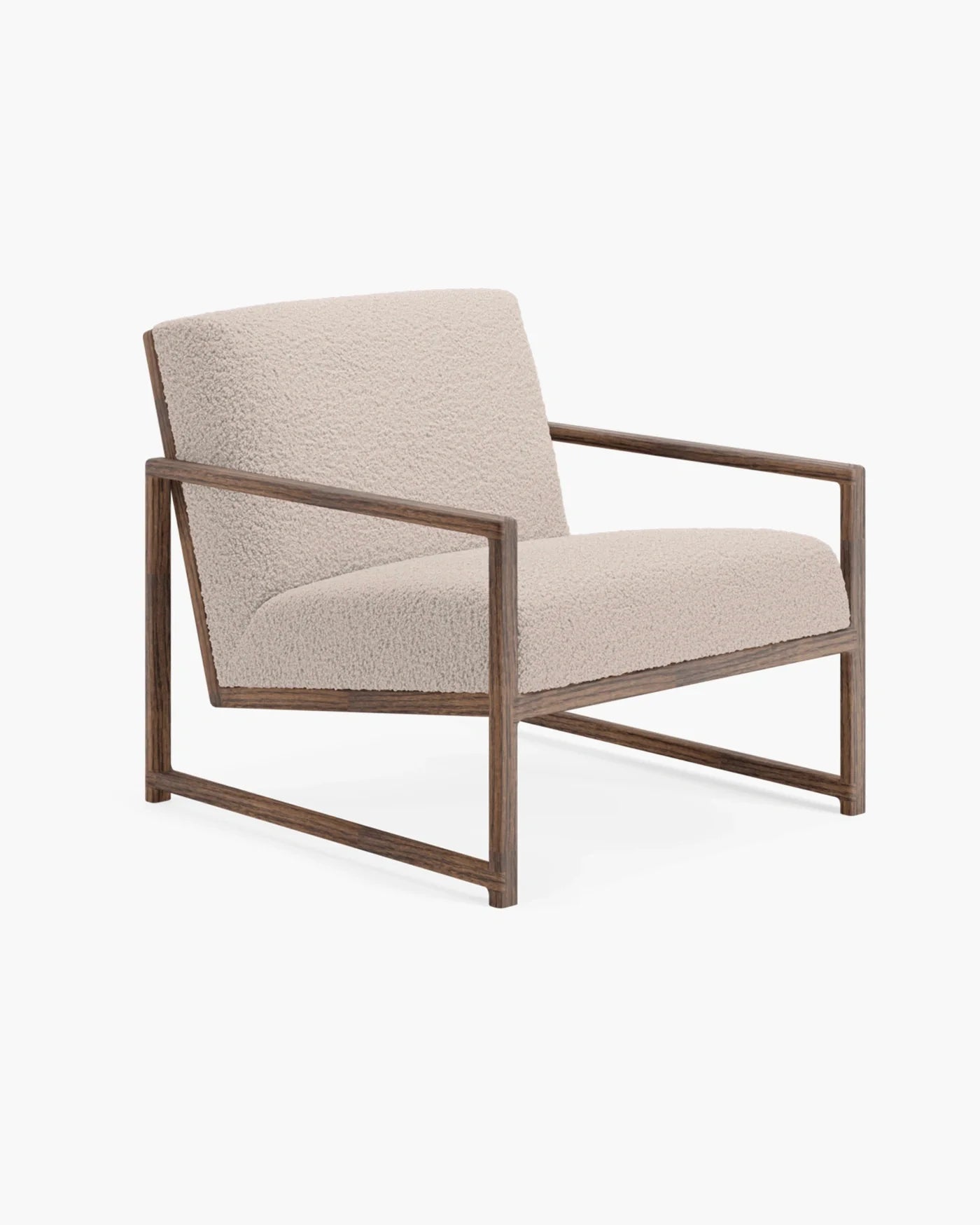 Kent dark oak armchair with greige bouclé upholstery, ideal for adding texture and depth to neutral interiors.