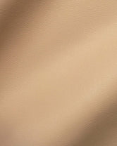 Close-up of Latte vegan leather, showing its fine grain