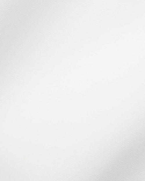 Close-up of White vegan leather, showing its fine grain