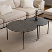 Leo Coffee Table 2-set by by Crea with Grafite Dekton tops and black steel frame, placed in a Scandinavian living room with neutral corner sofa and soft rug. Designer handmade coffee tables for modern interiors.