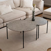 Leo Coffee Table 2-set from by Crea with Grigio Dekton tops and black steel frames, styled in a minimalist Scandinavian living room with a cream sofa and wool rug. Handmade modern furniture for elegant interiors.