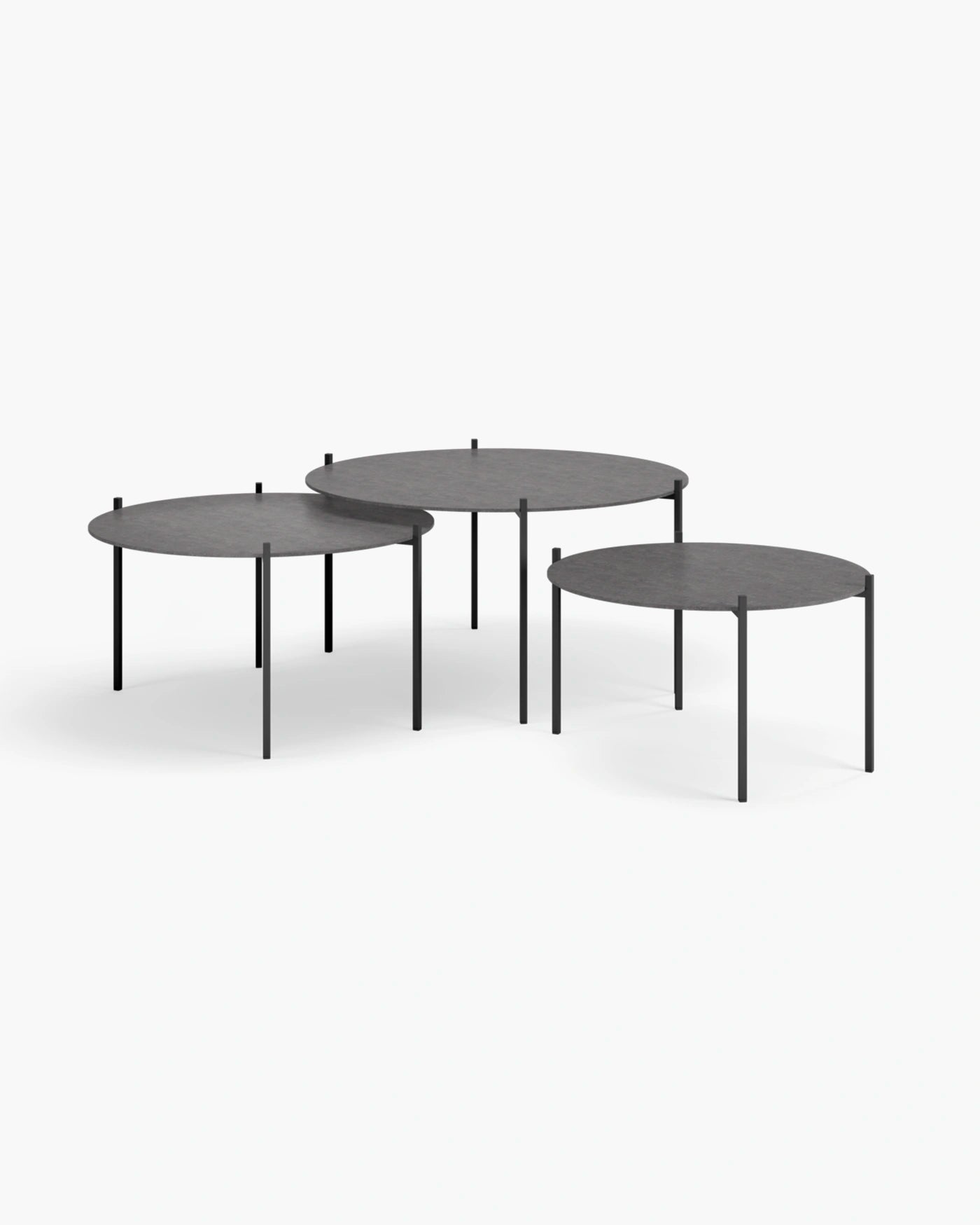 Leo coffee table set in black with Grafite dekton, featuring three sleek round tables with minimalist design.