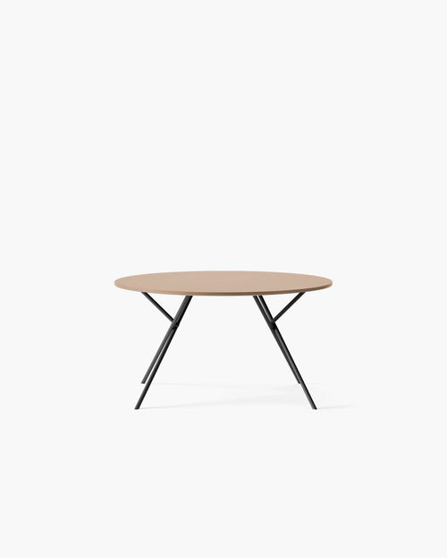 Luna Dining Table - A round, modern table design featuring sleek lines and functional aesthetics.