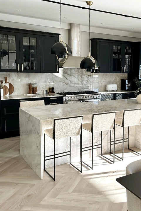 Bar Stool Philip in ivory bouclé in a styled kitchen interior