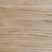 Close-up of light wood grain, showcasing natural patterns and texture of wood samples for selection.