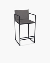 Outdoor Bar Stool Folke with black powder-coated stainless steel frame and Dusk olefin cushion.