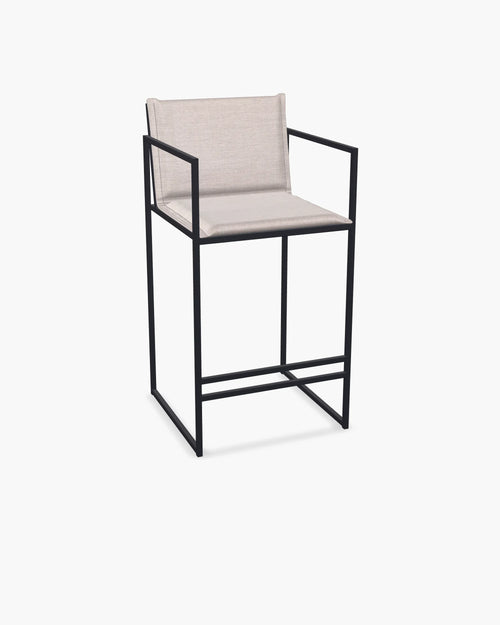Outdoor Bar Stool Folke with black powder-coated stainless steel frame and Oat olefin cushion.