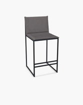 Outdoor Bar Stool Valter with black powder-coated stainless steel frame and Dusk olefin cushion.