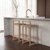 Ebba bar stools in oak at a modern kitchen counter with minimalist design and natural wood finish.