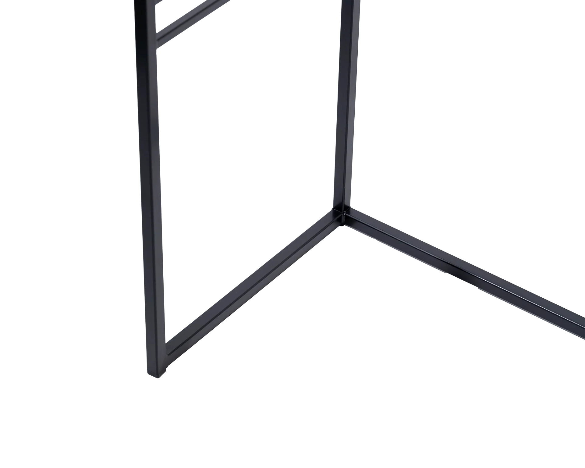 Detail of powder-coated black steel frame at the base of a minimalist sideboard, showcases clean lines and Scandinavian-inspired craftsmanship.