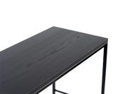 Detail view of black oak top on modern sideboard with matte powder-coated steel frame, high-quality close-up in PNG format highlighting natural wood grain and edge profile.