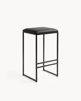 Black bar stool with a white background