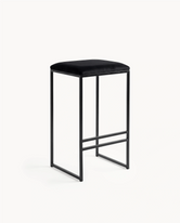 Black bar stool with a white background