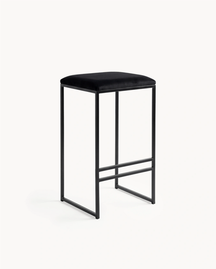 Bar Stool Svea by Crea with black frame and jade black velvet seat, studio view