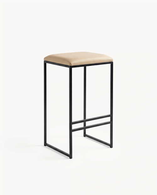 Bar stool with beige cushioned seat and black metal frame on a white background