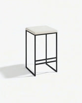 Bar Stool Svea – Black frame with sand leather seat, minimalistic design for modern interiors.