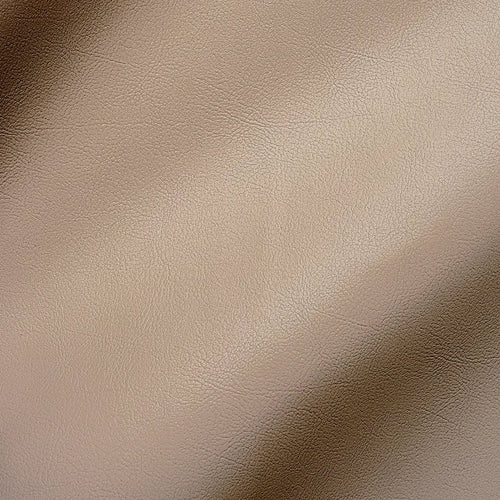 Taupe vegan leather texture with soft matte finish and natural grain pattern, ideal for sustainable, cruelty-free furniture upholstery in Scandinavian interiors.