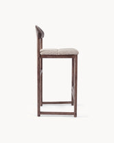 Side view of the Oak Bar Stool Ted in dark oak and greige bouclé upholstery, ideal for kitchen islands and dining areas.