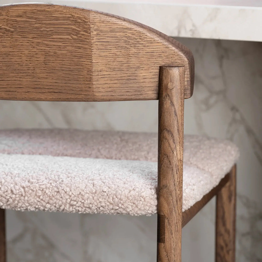 Oak Bar Stool with greige bouclé seat and dark oak frame, perfect for stylish dining spaces.