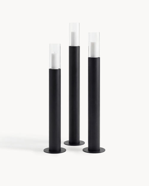 Candleholder Thomas – Set of 3 – Black Frame featuring three floor-standing candle holders in black with clear glass cylinders.