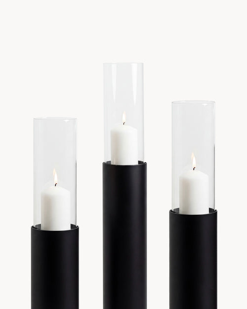 Candleholder Thomas set of 3 in black frame with clear glass cylinders and white candles, ideal for indoor decor.