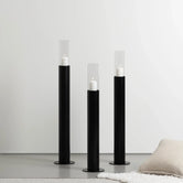 Candleholder Thomas – Set of 3 black floor candleholders adding Nordic style and height to any space.