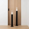 Thomas Floor candleholder set in black with light glass cylinders, perfect for adding elegance to any room.