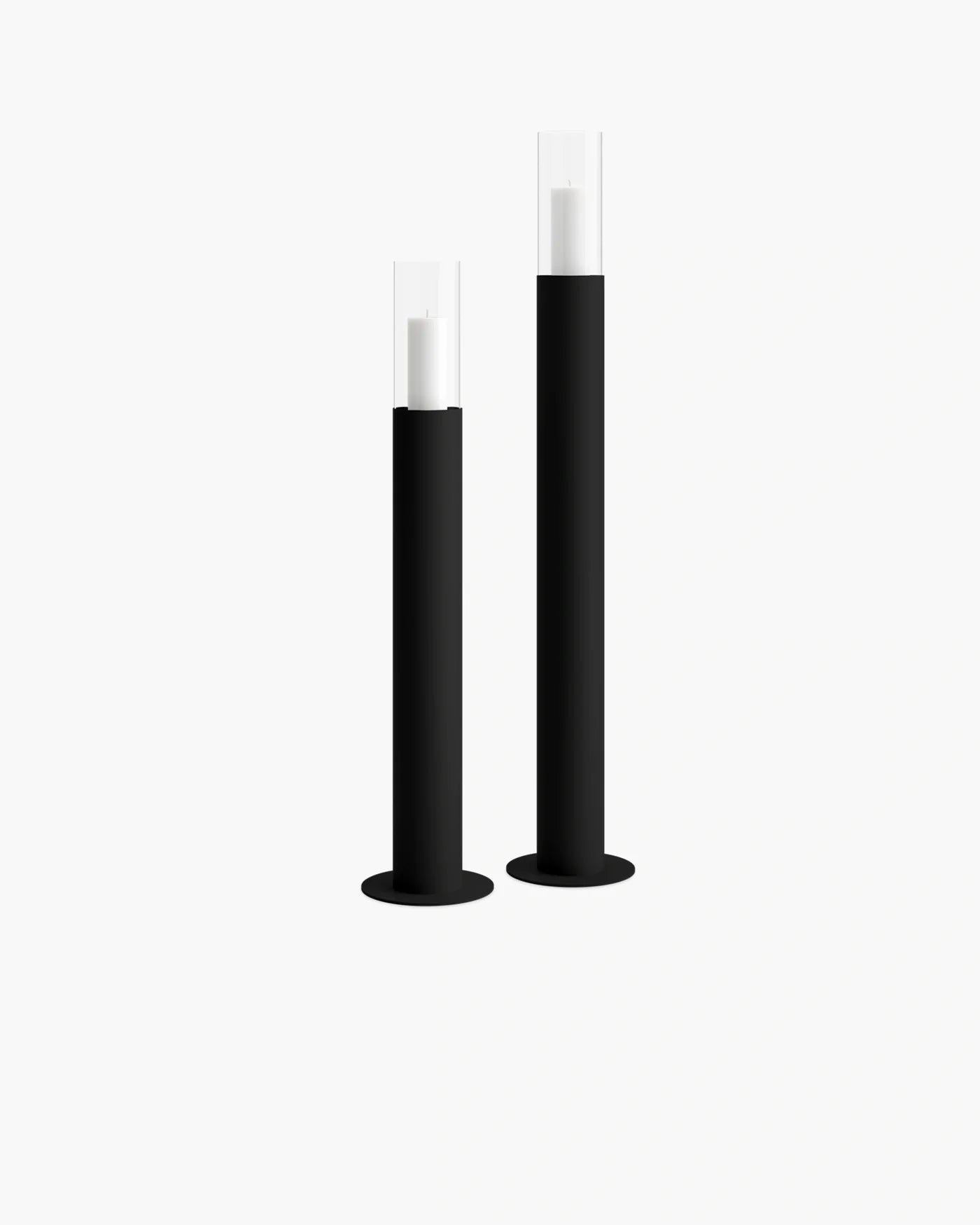 Thomas floor candleholder set in minimalist design with glass cylinders, perfect for elevating your space.