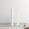 Set of 2 white floor candleholders, minimalist design, perfect for brightening up your space with calm, clean style.