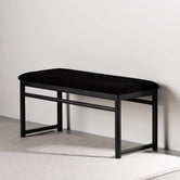Oak Bench with black oak frame and black bouclé cushion designed for architectural expression.